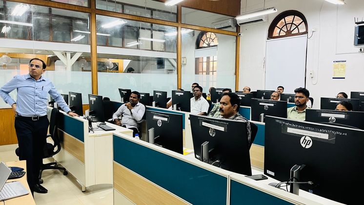 Participants working on the live portal in the lab